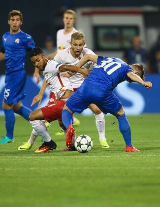 SOCCER - UEFA CL quali, Zagreb vs RBS ZAGREB,CROATIA,16.AUG.16 - SOCCER - UEFA Champions League, Play-off qualification, GNK Dinamo Zagreb vs Red Bull Salzburg. Image shows Maciel Wanderson, Konrad Laimer (RBS) and Marko Rog (Zagreb). GEPAxpictures xFelixxRoittner