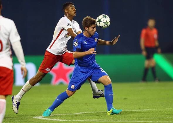 SOCCER - UEFA CL quali, Zagreb vs RBS ZAGREB,CROATIA,16.AUG.16 - SOCCER - UEFA Champions League, Play-off qualification, GNK Dinamo Zagreb vs Red Bull Salzburg. Image shows Bernardo Fernandes da Silva Junior (RBS) and Bojan Knezevic (Zagreb). GEPAxpictures xFelixxRoittner