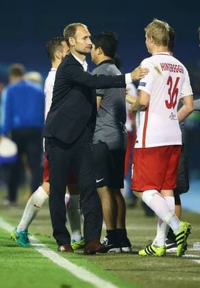 SOCCER - UEFA CL quali, Zagreb vs RBS ZAGREB,CROATIA,16.AUG.16 - SOCCER - UEFA Champions League, Play-off qualification, GNK Dinamo Zagreb vs Red Bull Salzburg. Image shows CEO Jochen Sauer and Martin Hinteregger (RBS). GEPAxpictures xFelixxRoittner