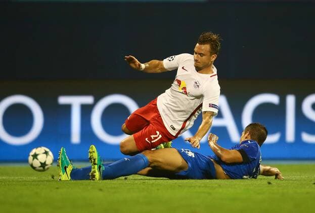 SOCCER - UEFA CL quali, Zagreb vs RBS ZAGREB,CROATIA,16.AUG.16 - SOCCER - UEFA Champions League, Play-off qualification, GNK Dinamo Zagreb vs Red Bull Salzburg. Image shows Fredrik Gulbrandsen (RBS) and Filip Benkovic (Zagreb). GEPAxpictures xFelixxRoittner
