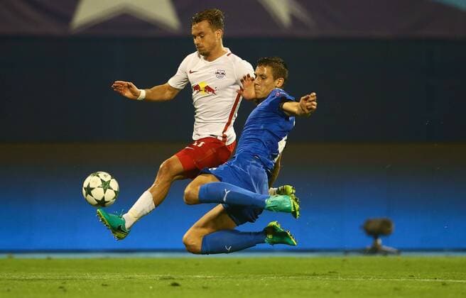SOCCER - UEFA CL quali, Zagreb vs RBS ZAGREB,CROATIA,16.AUG.16 - SOCCER - UEFA Champions League, Play-off qualification, GNK Dinamo Zagreb vs Red Bull Salzburg. Image shows Fredrik Gulbrandsen (RBS) and Filip Benkovic (Zagreb). GEPAxpictures xFelixxRoittner