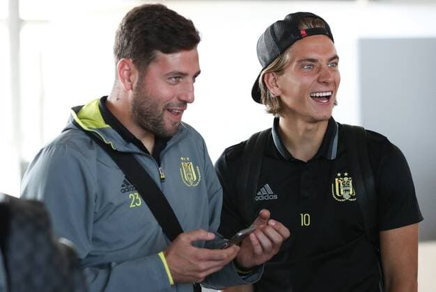 Anderlecht s Frank Boeckx and Anderlecht s Dennis Praet pictured during the departure of Belgian first league soccer team RSC Anderlecht to Prague, Czech Republic, at Brussels Airport in Zaventem, Wednesday 17 August 2016. Tomorrow Anderlecht is playing the first leg of the playoff round in the Europa League competition against Czech Slavia Prague. VIRGINIExLEFOUR  x04912844x