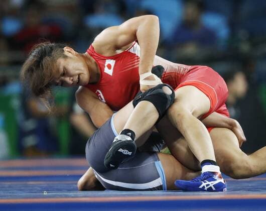 Japan s Icho wins in women s freestyle 58 kg 2nd round Japan s Kaori Icho (on top) faces off against Marwa Amri of Tunisia in a women s freestyle 58-kilogram class second round match at the Rio de Janeiro Olympics on Aug. 17, 2016. Icho won. 