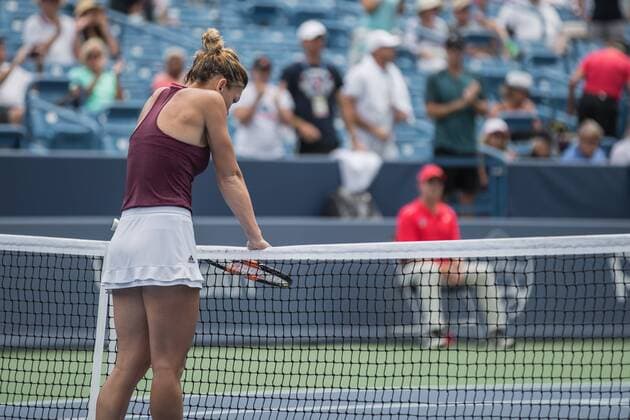 August 17, 2016 - Mason, Ohio, USA - Simona Halep (ROU) leans on the net at center court after winning Wednesday s match that was resumed from Tuesday s rain delay of the Western and Southern Open at at the Lindner Family Tennis Center , Mason, Oh. Tennis 2016 - Western And Southern Open - Day 5 - ZUMAs304