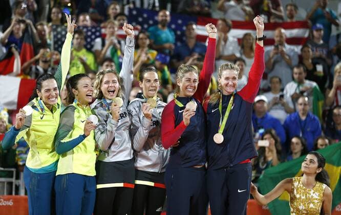 Olympics 2016 Beach volleyball Beachvolleyball RIO DE JANEIRO, RJ - 18.08.2016: OLYMPICS 2016 BEACH VOLLEYBALL - German duo celebrates victory with Olympic medalists after valid match for the gold medal between the double Laura Ludwig Kira Walkenhorst (GER) and Agatha Bednarczuk Rippel Barbara Seixas de Freitas (BRA) in the Rio Olympics Beach Volleyball 2016 held in Beach Volleyball Arena on Copacabana Beach. NOT AVAILABLE FOR LICENSING IN CHINA (Photo: Rodolfo Buhrer La Imagem Fotoarena) x1187741x  RodolfoxBuhrer