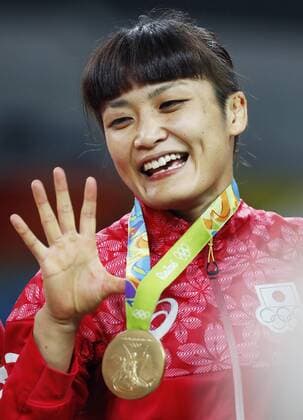 Olympics: Icho wins 58-kg gold in women s wrestling Gold medalist Kaori Icho of Japan smiles during the award ceremony for the women s freestyle wrestling 58-kilogram class at the Rio de Janeiro Olympics on Aug. 17, 2016. Icho defeated Valeriia Koblova Zholobova of Russia in the final to win Olympic gold for the fourth consecutive time. 
