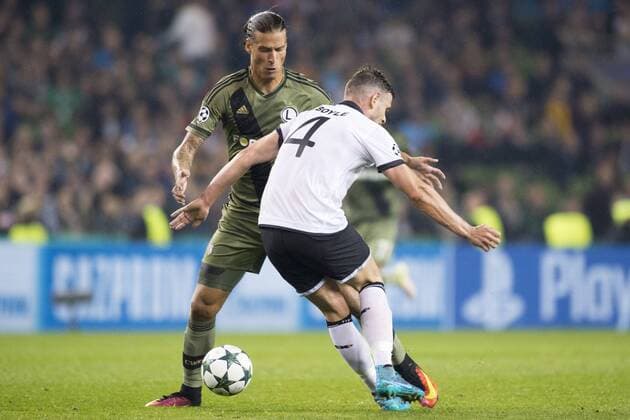 August 17, 2016 - Dublin, Ireland - Aleksandar Prijovic of Legia and Andy Boyle of Dundalk fight for the ball during the UEFA Champions League Play-Offs 1st leg between Dundalk FC and Legia Warsaw at Aviva Stadium in Dublin, Ireland on August 17, 2016 Dundalk v Legia Warsaw: UEFA Champions League  - ZUMAn230