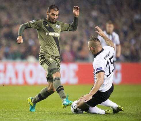 August 17, 2016 - Dublin, Ireland - Nemanja Nikolic of Legia fights for the ball with Patrick Barrett of Dundalk during the UEFA Champions League Play-Offs 1st leg between Dundalk FC and Legia Warsaw at Aviva Stadium in Dublin, Ireland on August 17, 2016 Dundalk v Legia Warsaw: UEFA Champions League  - ZUMAn230