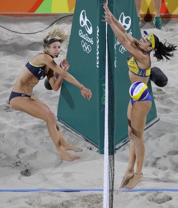 German duo win gold in women s Beach volleyball Beachvolleyball Germany s Laura Ludwig (L) spikes during the women s beach volleyball final against Brazil at the Rio de Janeiro Olympics on Aug. 18, 2016. Germany won 2-0. 