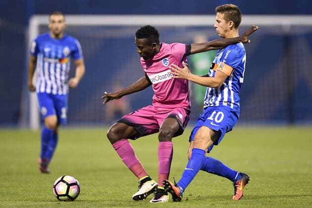 Genk s Wilfried Onyinye Ndidi and Lokomotivo s Ivan Fiolic fight for the ball during the first leg match of the playoff round between Croatian team Lokomotiva Zagreb and Belgian first league soccer team KRC Genk in the Europa League competition, on Thursday 18 August 2016, in Zagreb, Croatia. YORICKxJANSENS  x04913762x