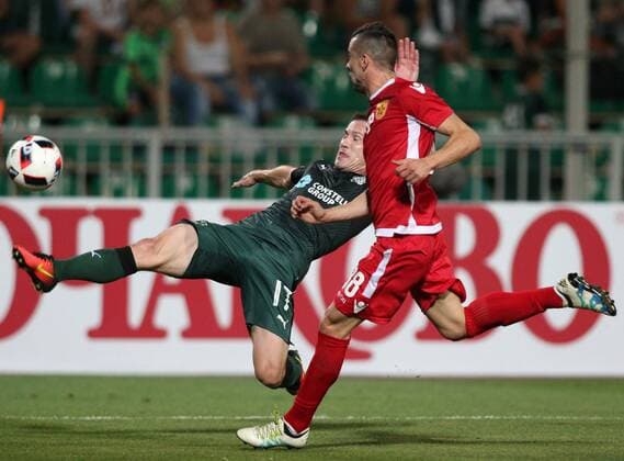 KRASNODAR, RUSSIA - AUGUST 18, 2016: Krasnodar s Vitaly Kaleshin (L) and Partizani Tirana s Emiljano Vila in the first leg of their UEFA Europa League play-off tie at Kuban Stadium. Vitaly Timkiv TASS  TS02DAEF
