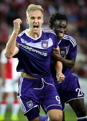Anderlecht s Lukas Teodorczyk and Anderlecht s Idrissa Sylla celebrate after scoring the 2-0 goal during the first leg match of the playoff round between Belgian first league soccer team RSC Anderlecht and Czech team Slavia Prague in the Europa League competition, on Thursday 18 August 2016, in Prague, Czech Republic. VIRGINIExLEFOUR  x04913787x