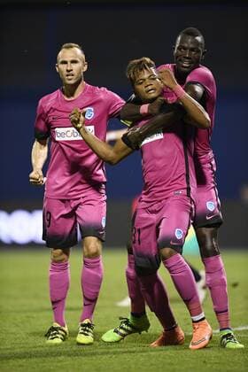 Genk s Thomas Buffel, Genk s Leon Bailey and Genk s Omar Colley celebrate during the first leg match of the playoff round between Croatian team Lokomotiva Zagreb and Belgian first league soccer team KRC Genk in the Europa League competition, on Thursday 18 August 2016, in Zagreb, Croatia. YORICKxJANSENS  x04913866x
