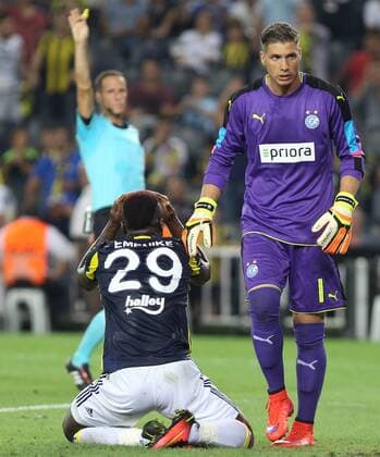 UEFA Europa league Playoff first leg match between Fenerbahce and Grasshoppers at Ulker Stadium in Istanbul on August 18 , 2016. Pictured: Emamnuel Emenike of Fenerbahce and Goalkeeper Vaso Vasic of Grasshoppers. Not available for publication in Turkey. 