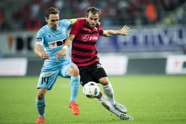 Gent s Sven Kums and Shkendija s Stephan Vujcic fight for the ball during the first leg match of the playoff round between Belgian first league soccer team KAA Gent and Macedonia s first league soccer team Shkendija in the Europa League competition, on Thursday 18 August 2016, in Gent. JASPERxJACOBS  x04914080x