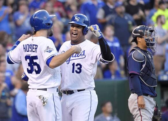 August 20, 2016 - Kansas City, MO, USA - Kansas City Royals Salvador Perez is greeted by Eric Hosmer behind Kansas City Royals third baseman Mike Moustakas after hitting a two run home run in the fifth inning during Saturday s baseball game on Aug. 20, 2016 at Kauffman Stadium in Kansas City, Mo. Twins vs. Royals - ZUMAm67_