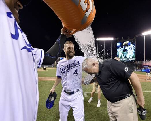 August 20, 2016 - Kansas City, MO, USA - Kansas City Royals Alex Gordon makes sure that Fox Sports Kansas City s Joel Goldberg gets the brunt of the Salvador Perez splash after the teams 10-0 win over the Minnesota Twins during Saturday s baseball game on Aug. 20, 2016 at Kauffman Stadium in Kansas City, Mo. Royals beat Twins 10-0 - ZUMAm67_