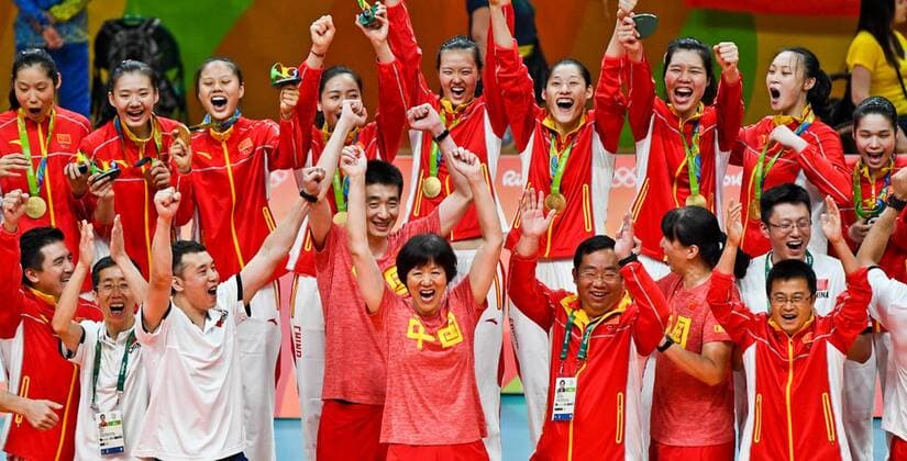 RIO DE JANEIRO, BRAZIL - AUGUST 20: Chinese players celebrate on the podium after winning gold during the Volleyball Women s Gold Medal Match between Serbia and China on Day 15 of the Rio 2016 Olympic Games Olympische Spiele Olympia OS at the Maracanazinho on August 20, 2016 in Rio de Janeiro, Brazil.  CFP490691464 