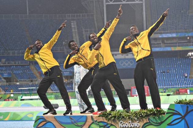Rio 2016, Rückblick auf olympische Momente Bilder des Tages - SPORT Members of the Jamaica relay team strike a pose on the podium as they celebrate the silver medal in the Men s 4x400m relay at the 2016 Rio Summer Olympics in Rio de Janeiro, Brazil, on August 20, 2016. (L-R) Peter Matthews, Nathon Allen, Fitzroy Dunkley and Javon Francis.  OLY201608209935 RICHARDxELLIS