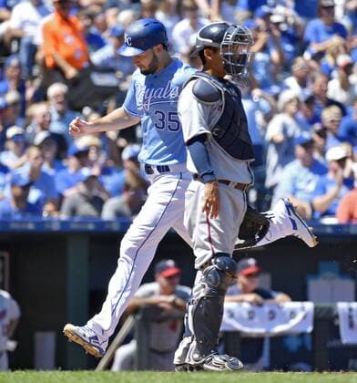 August 21, 2016 - Kansas City, MO, USA - Kansas City Royals Eric Hosmer scores behind Minnesota Twins catcher Kurt Suzuki on a sacrifice fly by Alcides Escobar in the second inning on Sunday, Aug. 21, 2016 at Kauffman Stadium in Kansas City, Mo. Minnesota Twins vs. Kansas City Royals - ZUMAm67_