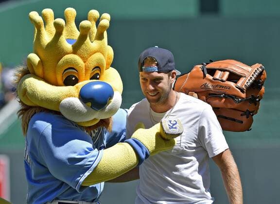 August 21, 2016 - Kansas City, MO, USA - Olympic gold medalist Jack Sock gets a hug from Kansas City Royals mascot Sluggerrr after throwing out a first pitch before Sunday s baseball game between the Kansas City Royals and Minnesota Twins on Aug. 21, 2016 at Kauffman Stadium in Kansas City, Mo. Minnesota Twins vs. Kansas City Royals - ZUMAm67_