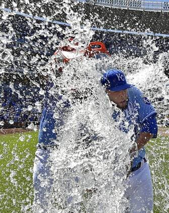 August 21, 2016 - Kansas City, MO, USA - Kansas City Royals relief pitcher Kelvin Herrera gets a Gatorade splash from Salvador Perez after closing out the ninth inning for a 2-1 win over the Minnesota Twins on Sunday, Aug. 21, 2016 at Kauffman Stadium in Kansas City, Mo. Minnesota Twins vs. Kansas City Royals - ZUMAm67_