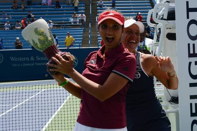 August 21, 2016 - Mason, Ohio, United States - SANIA MIRZA of India and BARBORA STRYCOVA of the Czech Republic with their trophies after winning the doubles final of the Western & Southern Open Tennis Tournament in Mason Ohio. Tennis 2016 - Western & Southern Open - Day 9 - ZUMAl132