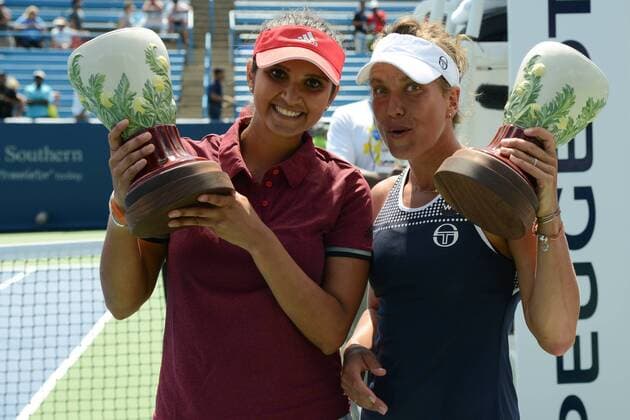 August 21, 2016 - Mason, Ohio, United States - SANIA MIRZA of India and BARBORA STRYCOVA of the Czech Republic with their trophies after winning the doubles final of the Western & Southern Open Tennis Tournament in Mason Ohio. Tennis 2016 - Western & Southern Open - Day 9 - ZUMAl132