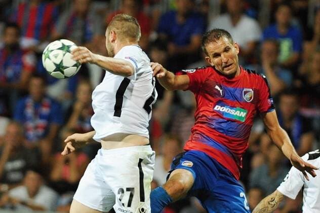 Cosmin Moti of Ludogorets Razgrad, left, and Marek Bakos of Viktoria Pilsen in action during the 4th qualifying round of football Champions League return match FC Viktoria Pilsen vs PFC Ludogorets Razgrad in Pilsen, Czech Republic, August 23, 2016. (CTKxPhoto PavelxNemecek) CTKPhotoP201608240198701  nmc18