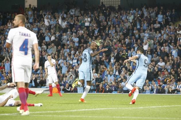 24.08.2016. Etihad Stadium, Manchester, England. Champions League Qualifying Football. Manchester City versus Steaua Bucharest. Manchester City midfielder Fabian Delph (18) is congratulated by Manchester City striker Nolito after scoring the first goal for City. xAlanxMartinx  ActionPlus11779755
