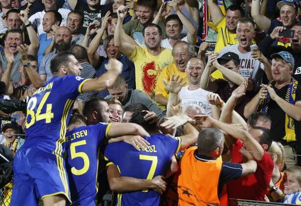 ROSTOV-ON-DON, RUSSIA - AUGUST 24, 2016: Rostov s players celebrate scoring in the 2016 17 UEFA Champions League First playoff round 2nd leg match against Ajax Amsterdam at Olimp-2 Stadium. FC Rostov won the game 4:1. Valery Matytsin TASS  TS02E7F3