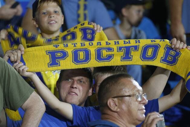 ROSTOV-ON-DON, RUSSIA - AUGUST 24, 2016: Rostov s fans rooting for their team in the 2016 17 UEFA Champions League First playoff round 2nd leg match against Ajax Amsterdam at Olimp-2 Stadium. FC Rostov won the game 4:1. Valery Matytsin TASS  TS02E7FA