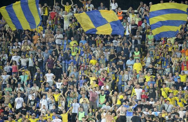 ROSTOV-ON-DON, RUSSIA - AUGUST 24, 2016: Rostov s fans rooting for their team in the 2016 17 UEFA Champions League First playoff round 2nd leg match against Ajax Amsterdam at Olimp-2 Stadium. FC Rostov won the game 4:1. Valery Matytsin TASS  TS02E7FD