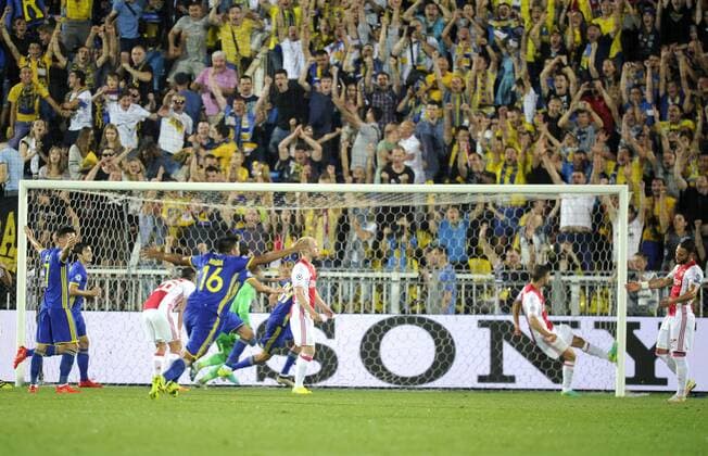 ROSTOV-ON-DON, RUSSIA - AUGUST 24, 2016: Rostov s players celebrate scoring in the 2016 17 UEFA Champions League First playoff round 2nd leg match against Ajax Amsterdam at Olimp-2 Stadium. FC Rostov won the game 4:1. Valery Matytsin TASS  TS02E809