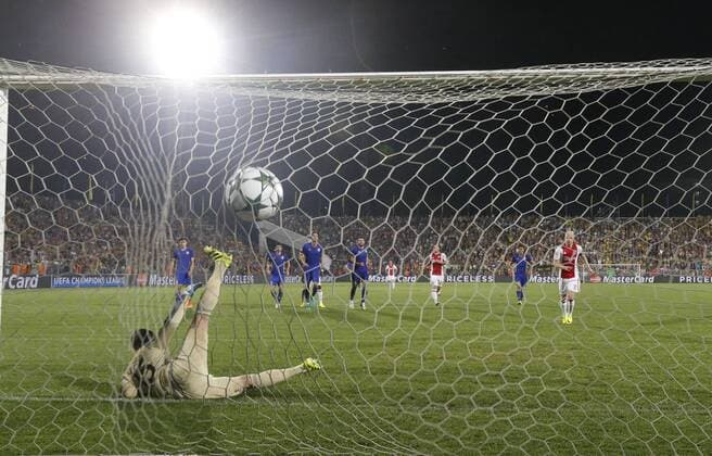 ROSTOV-ON-DON, RUSSIA - AUGUST 24, 2016: Rostov s goalkeeper Soslan Dzhanayev concedes a goal in the 2016 17 UEFA Champions League First playoff round 2nd leg match against Ajax Amsterdam at Olimp-2 Stadium. FC Rostov won the game 4:1. Valery Matytsin TASS  TS02E811