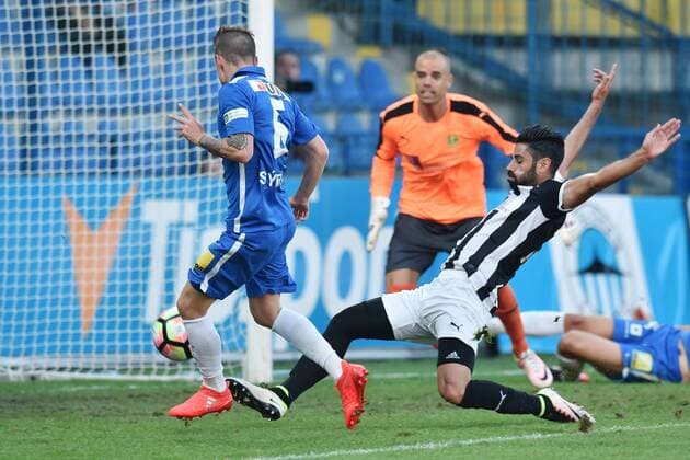 Jan Sykora (left) of Liberec shoots a goal, Costas Mintikkis (right) of Larnaca and goalkeeper Ruben Mino of Larnaca during the fourth qualifying round return Europa League match Slovan Liberec vs AEK Larnaca in Liberec, Czech Republic, August 25, 2016. (CTKxPhoto RadekxPetrasek) CTKPhotoP201608250967301  PER 2
