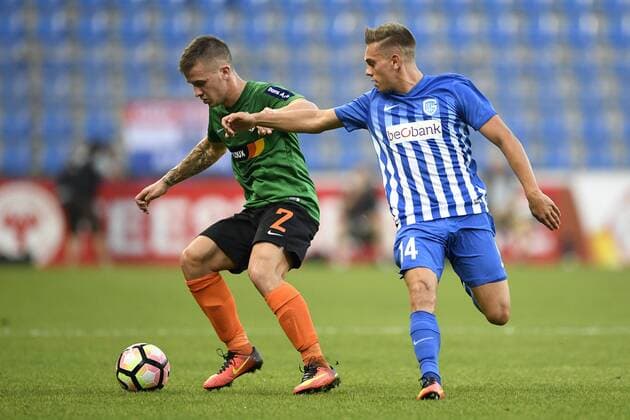 Lokomotivo s Karlo Bartolec and Genk s Leandro Trossard fight for the ball during a match between Belgian first league team KRC Genk and Croatian Lokomotiva Zagreb, the return leg of the playoff round in the Europa League competition, in Genk, Thursday 25 August 2016. First leg ended on 2-2 draw result in Croatia. YORICKxJANSENS  x04918682x
