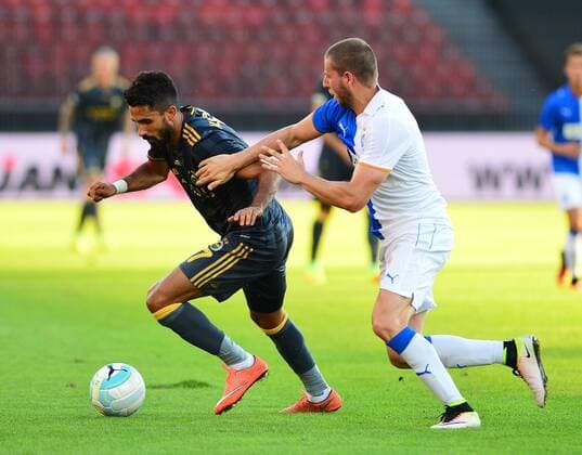 UEFA Europa league Playoff second leg match between Grasshoppers and Fenerbahce at Letzigrund Stadium in Zurich, Swiss on August 25 , 2016. Pictured: Alper Potuk (L) of Fenerbahce and Nemanja Antonov (R) of Grasshoppers. Not available for publication in Turkey. 