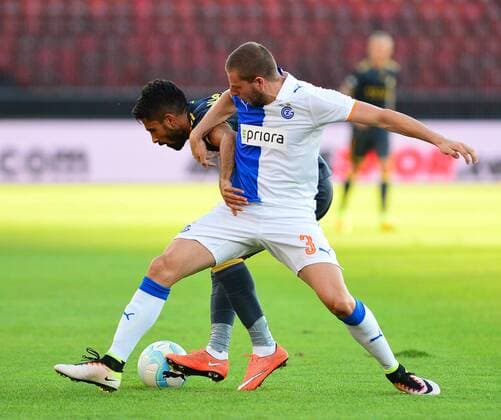 UEFA Europa league Playoff second leg match between Grasshoppers and Fenerbahce at Letzigrund Stadium in Zurich, Swiss on August 25 , 2016. Pictured: Alper Potuk (L) of Fenerbahce and Nemanja Antonov (R) of Grasshoppers. Not available for publication in Turkey. 