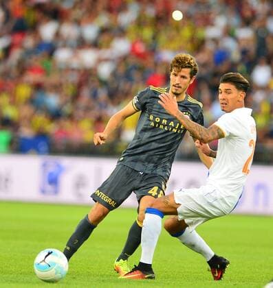Fußball, EL Quali, Grasshopper Zürich - Fenerbahce Istanbul UEFA Europa league Playoff second leg match between Grasshoppers and Fenerbahce at Letzigrund Stadium in Zurich, Swiss on August 25 , 2016. Pictured: Salih Ucan of Fenerbahce and Jean-Pierre Rhyner of Grasshoppers. Not available for publication in Turkey. 