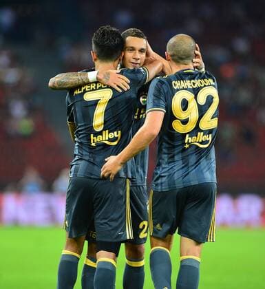 UEFA Europa league Playoff second leg match between Grasshoppers and Fenerbahce at Letzigrund Stadium in Zurich, Swiss on August 25 , 2016. Final Score: Grasshoppers 0 - Fenerbahce 2 Pictured: Alper Potuk , Gregory van der Wiel and Aatif Chahechouhe of Fenerbahce. Not available for publication in Turkey. 