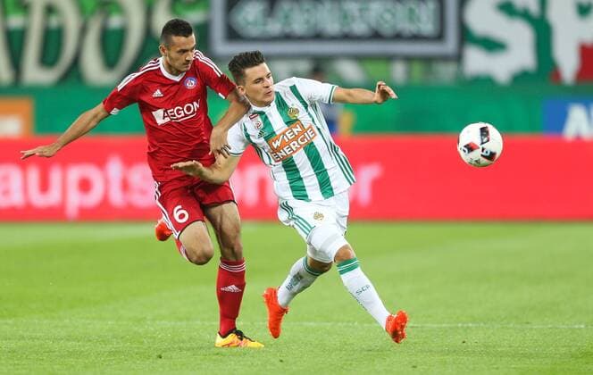 SOCCER - UEFA EL quali, Rapid vs Trencin VIENNA,AUSTRIA,25.AUG.16 - SOCCER - UEFA Europa League, Play-off qualification, SK Rapid Wien vs FK AS Trencin. Image shows Martin Sulek (Trencin) and Thomas Murg (Rapid). Keywords: Wien Energie. GEPAxpictures xPhilippxBrem