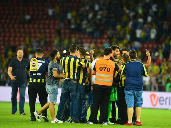 UEFA Europa league Playoff second leg match between Grasshoppers and Fenerbahce at Letzigrund Stadium in Zurich, Swiss on August 25 , 2016. Final Score: Grasshoppers 0 - Fenerbahce 2 Pictured:At the end of the game , Fenerbahce fans entered to the pitch in order to get a shirt of footballers of their teams. ( Goalkeeper Volkan Demirel ) Not available for publication in Turkey. 