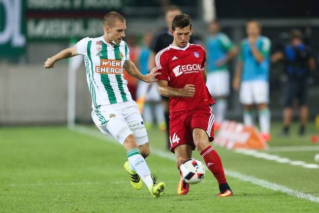 SOCCER - UEFA EL quali, Rapid vs Trencin VIENNA,AUSTRIA,25.AUG.16 - SOCCER - UEFA Europa League, Play-off qualification, SK Rapid Wien vs FK AS Trencin. Image shows Srdjan Grahovac (Rapid) and Jakub Holubek (Trencin). Keywords: Wien Energie. GEPAxpictures xPhilippxBrem
