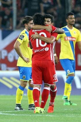 August 25, 2016 - Piraeus, Greece - Olympiaco s Argentinian midfielder Chori Dominguez (L) celebrates after scoring a goal with Olympiaco s Portuguese midfielder Andre Martins (R) during UEFA Europa League match between FC Olympiacos and FC Arouca at Georgios Karaiskakis Stadium in Piraeus on August 25, 2016. FC Olympiacos v FC Arouca - UEFA Europa League  - ZUMAn230