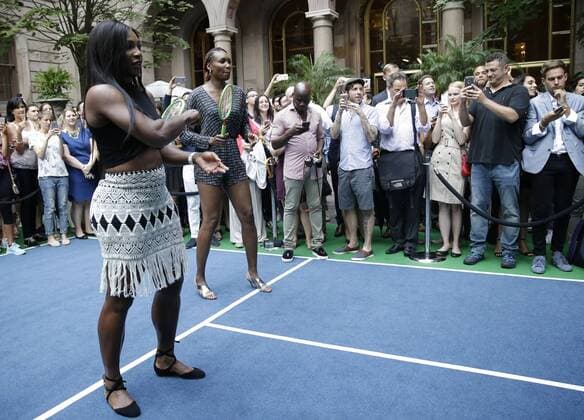 Tennis players Serena Williams and Venus Williams participate in a Virtual Tennis Tournament at Lotte New York Palace on August 25, 2016 in New York City. The US Open Tennis Championships begin on Monday.  NYP20160825113 JOHNxANGELILLO