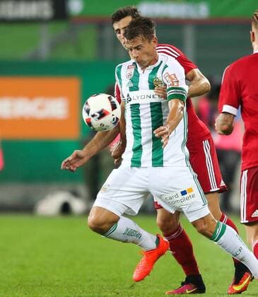 SOCCER - UEFA EL quali, Rapid vs Trencin VIENNA,AUSTRIA,25.AUG.16 - SOCCER - UEFA Europa League, Play-off qualification, SK Rapid Wien vs FK AS Trencin. Image shows Jakub Holubek (Trencin) and Stefan Schwab (Rapid). Keywords: Wien Energie. GEPAxpictures xPhilippxBrem