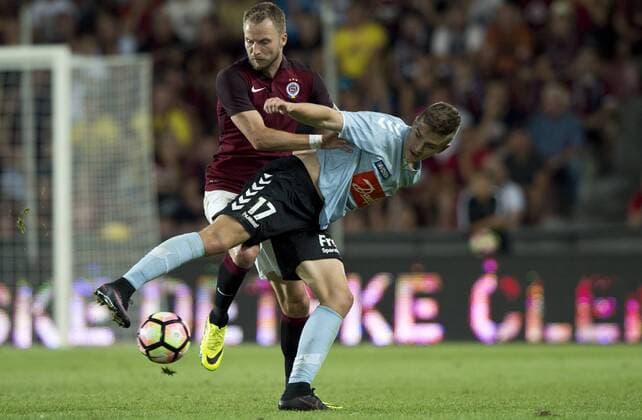 Michal Kadlec of Sparta, left, and Mikael Uhre of Sonderjyske in action during the fourth qualifying round return Europa League return match Sparta Praha vs Sonderjyske in Prague, Czech Republic, August 25, 2016. (CTKxPhoto MichalxKamaryt) CTKPhotoP201608251148701  kmt 16