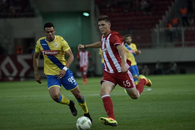 Greece: UEFA Europa League First playoff round, Game 2 Panagiotis Retsos (no 45) of Olympiacos trying to pass under the pressure of Walter Gonzalez (no 95) of Arouca. Final score, Olympiacos got 2 points while the Arouca got 1 point.  DimitriosxKarvountzisx xPacificxPress