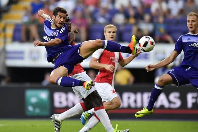 BRUSSELS, BELGIUM - AUGUST 25 : Alexandru Chipciu midfielder of RSC Anderlecht is fouled by Michael Ngadeu defender of SK Slavia Praha in the 16 FOOTBALL : Anderlecht vs Slavia Praha - Europa League - Bruxelles - 25 08 2016 PhotoNews Panoramic 